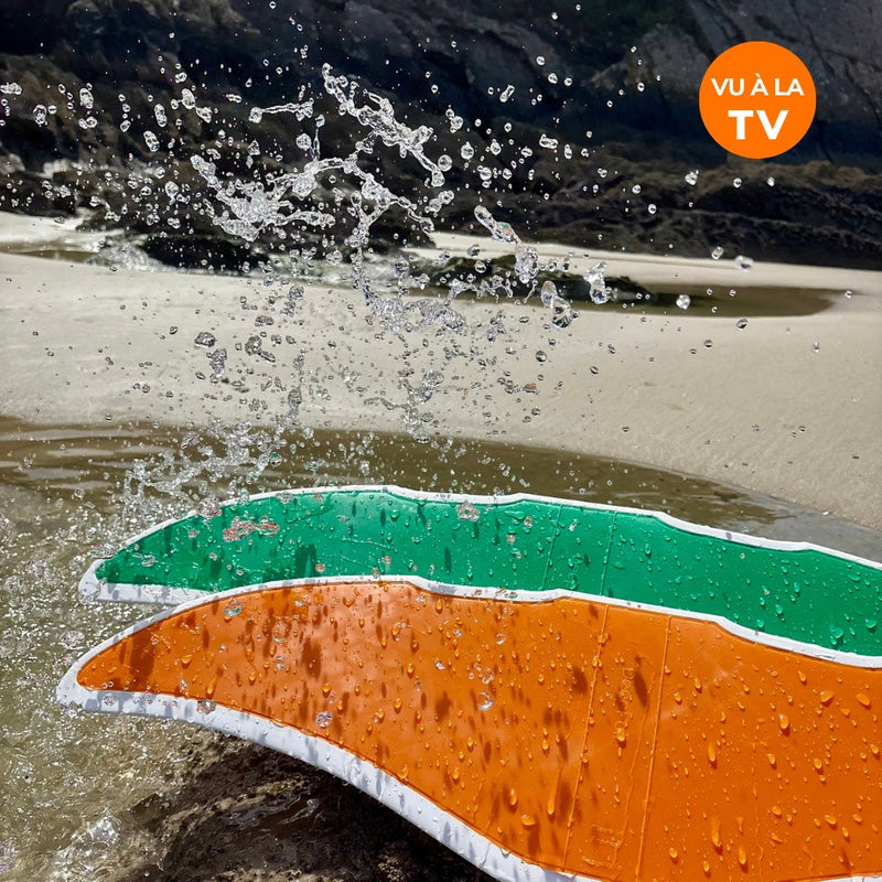 Photographie de deux DeepFoil sous des gouttes d'eau avec la mention "vu à la TV"
